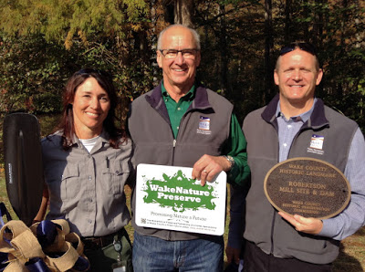 Deborah Robertson (Wake County Parks Open Space Manager), Wake County Commissioner Sig Hutchinson, and Chris Snow (Wake County Parks Director). Robertson Millpond Preserve was dedicated as a WakeNature Preserve and a Wake County Historic Landmark today.